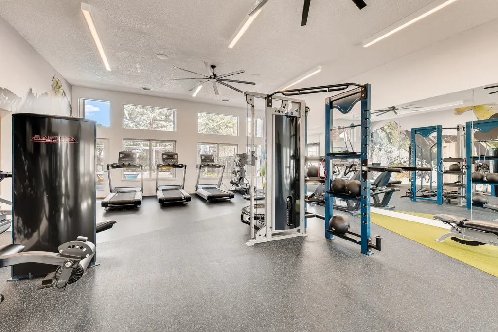 Fitness center with cardio and strength training equipment