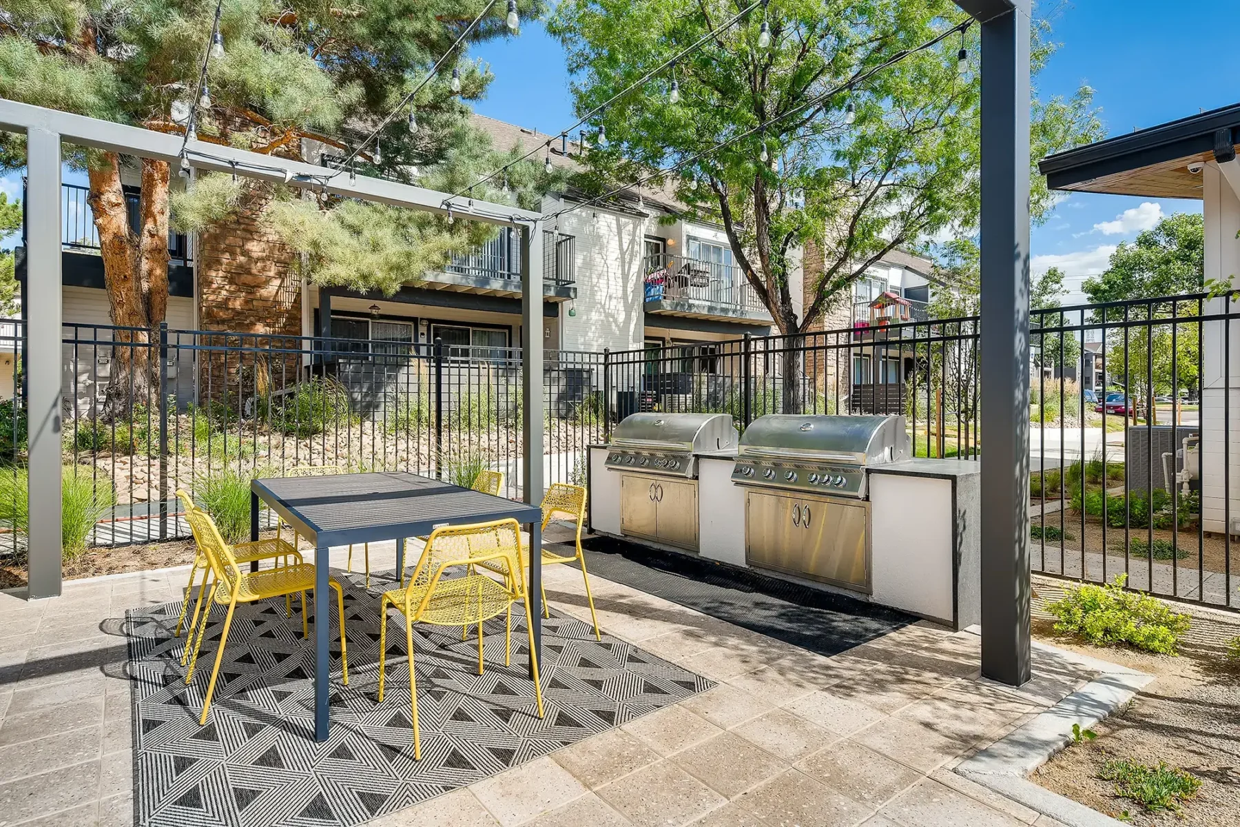 Outdoor grill area with tables